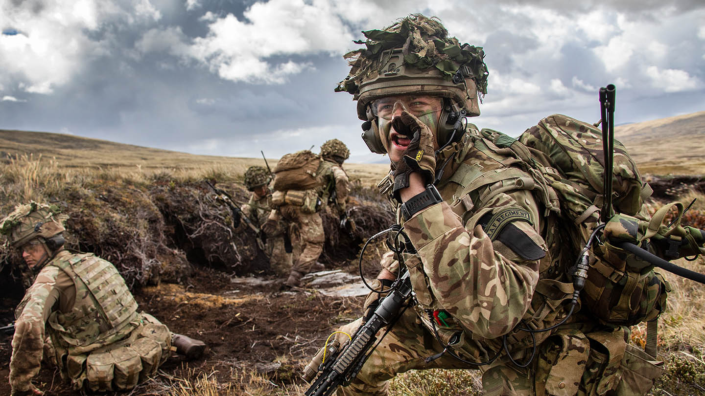 RAF Regiment Gunners on exercise on moorland
