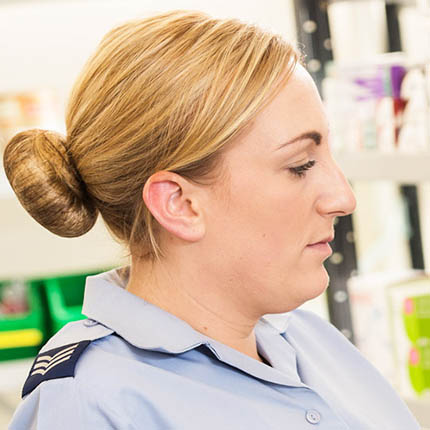 RAF Pharmacy Technician selecting medicine in pharmacy