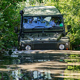 RAF Driver driving Land Rover into deep water during training