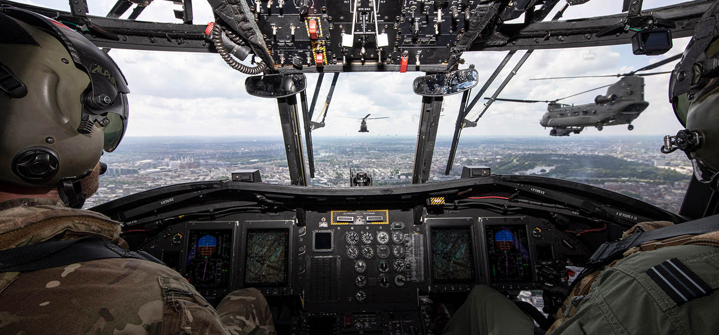 RAF Chinook and Pumas flying over London viewed from Chinook cockpit
