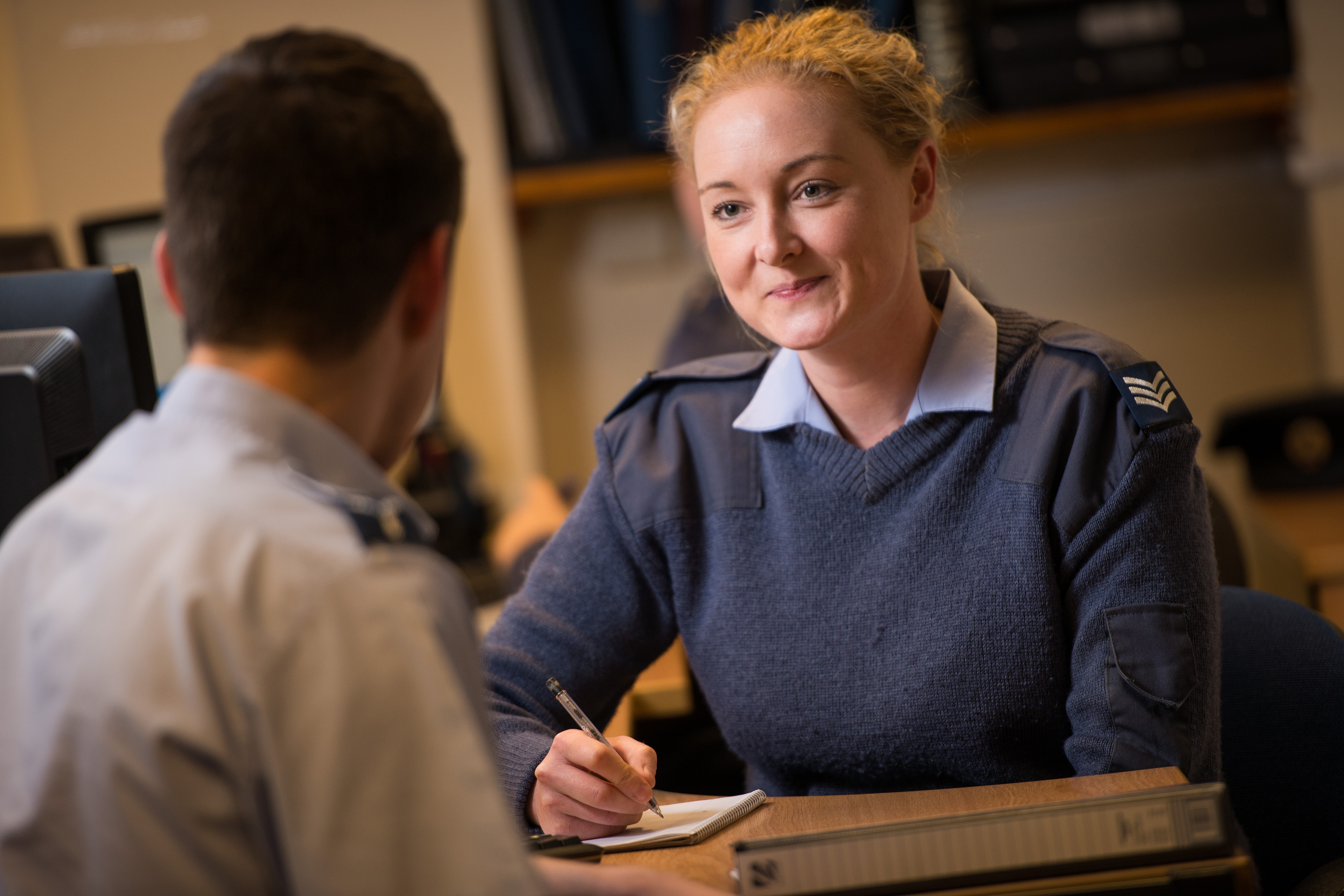 Sergeant Personnel Support advising airman